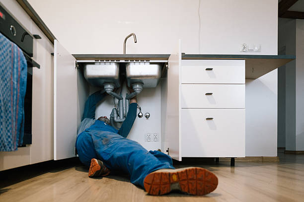 Professional Drain Cleaning technician working in Belford, NJ